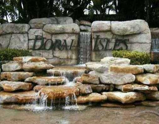 GORGEOUS TWO STORY HOME AT EXCLUSIVE DORAL ISLES Caribbean Bay 3BED/2/1 BATH . SPACIOUS & BRIGHT HOME FEATURES HIGH CEILINGS, CERAMIC THROUGHOUT AND WOOD FLOORS IN BEDROOMS, CUSTOM CLOSETS. OPEN KITCHEN WITH GRANITE COUNTERTOPS, STAINLESS STEEL APPLIANCES. 2 CAR GARAGE,UPGRADE KITCHEN. CLOSE TO PUBLIX, SCHOOL, TURNPIKE, AND SHOPPING PLAZA.