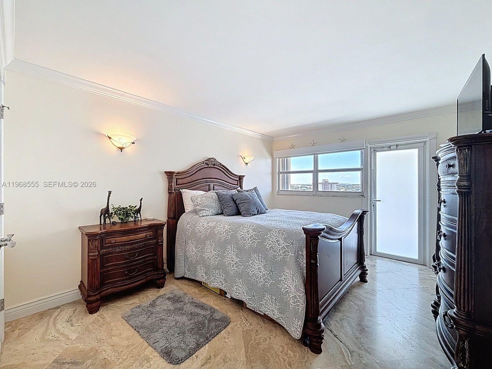 Spacious living room with panoramic views at 328 Ocean Blvd - Condo in Pompano Beach