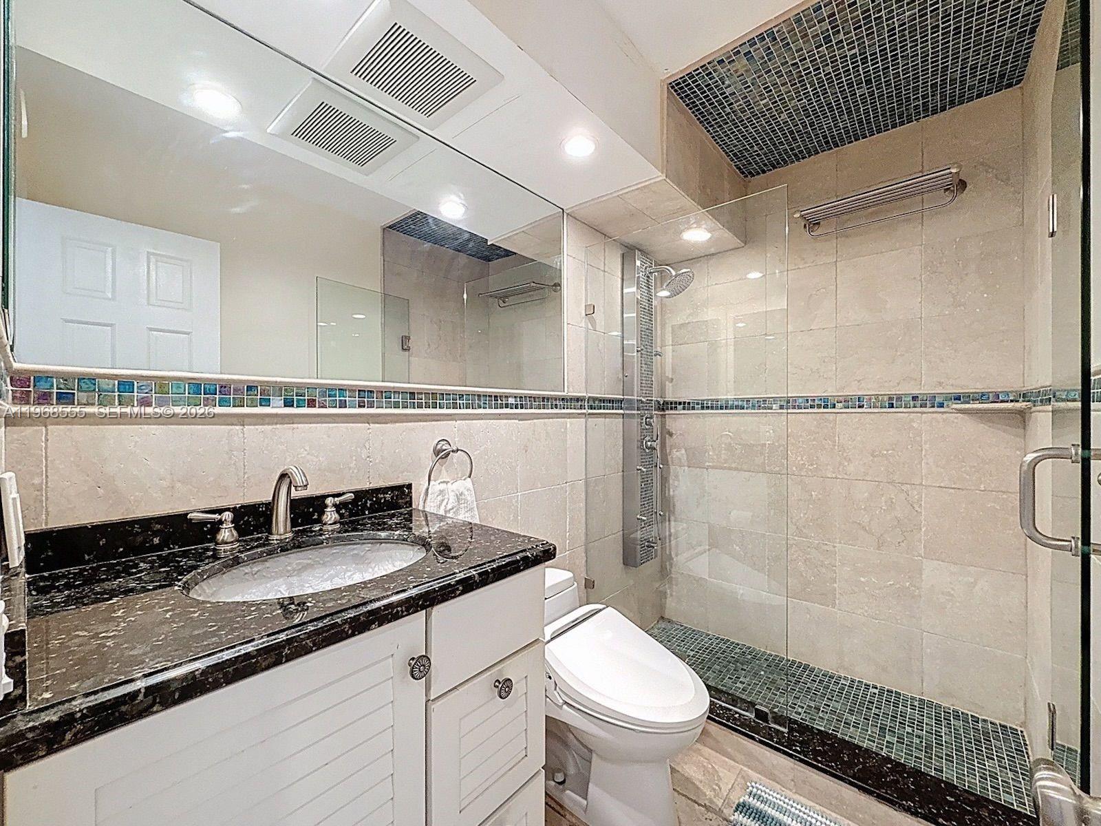Modern kitchen with designer features at 328 Ocean Blvd - Condo in Pompano Beach