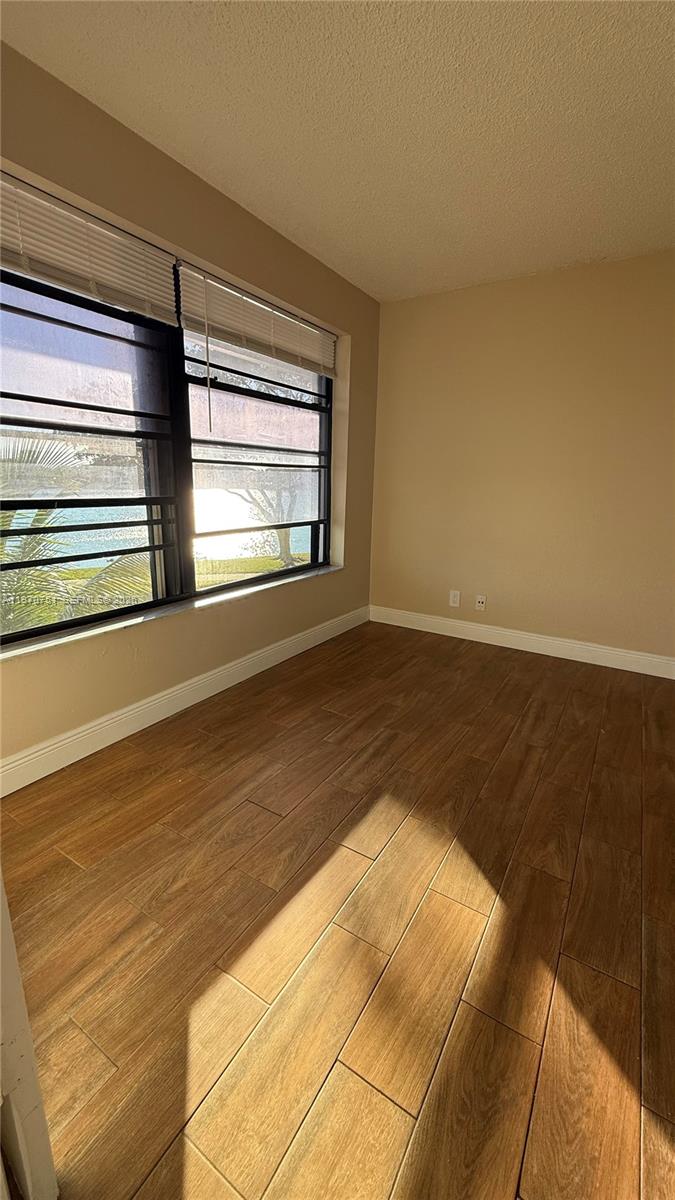 Modern kitchen with designer features at 201 Lake Pointe Dr - Condo in Oakland Park