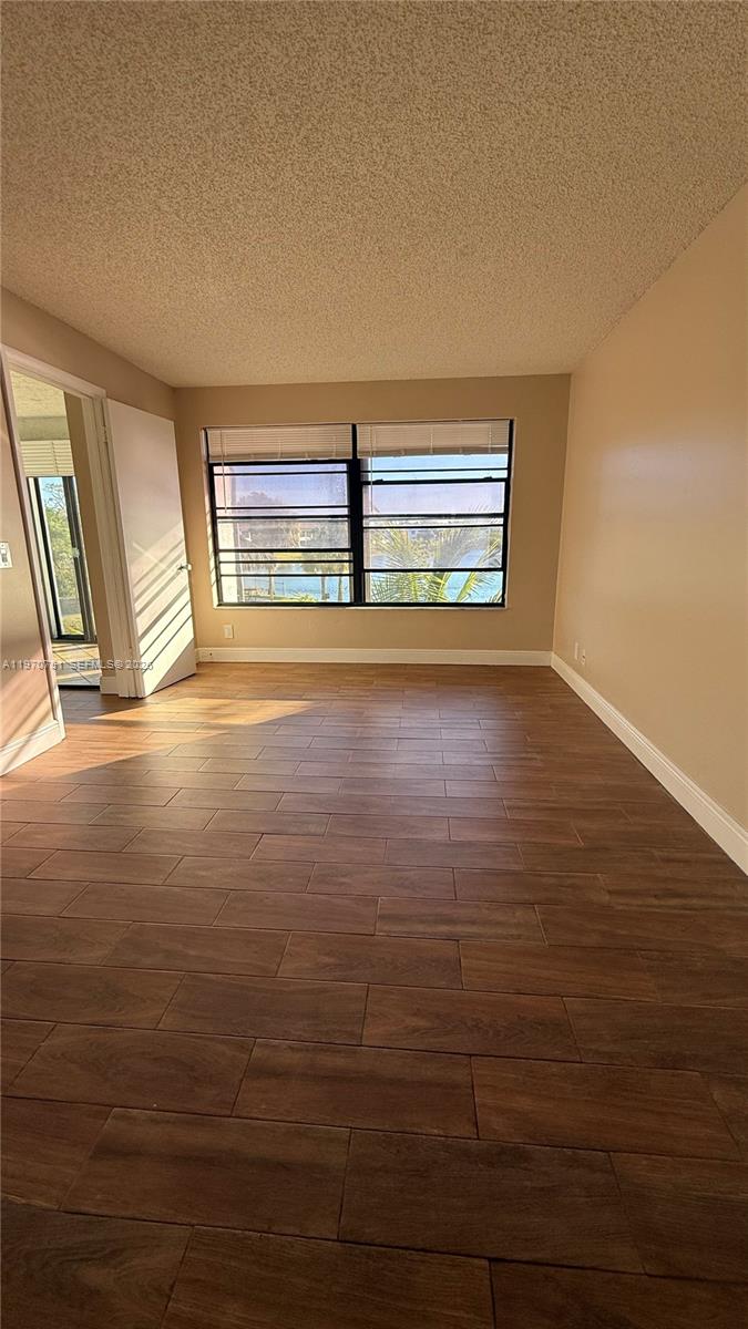 Elegant master bedroom retreat at 201 Lake Pointe Dr - Condo in Oakland Park