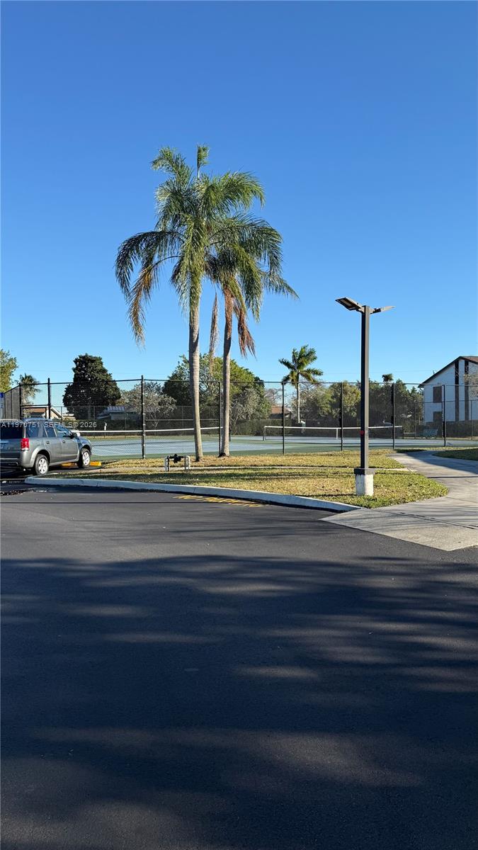 Spacious living room with panoramic views at 201 Lake Pointe Dr - Condo in Oakland Park