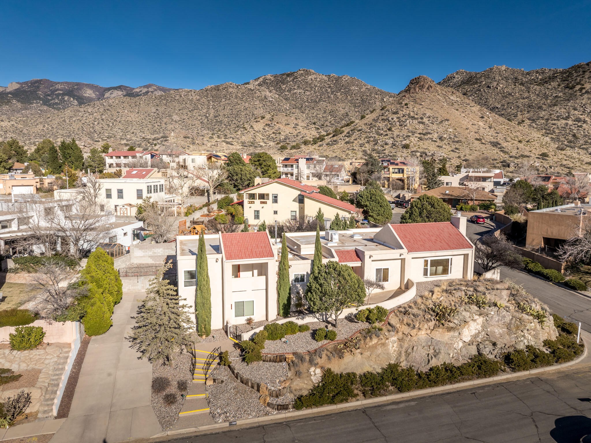 Photo 1 of Single family home for sale at 900 Piedra Larga Pl NE, Albuquerque, NM 87123 | MLS# 1098778 | Listing updated on 2026-10-11