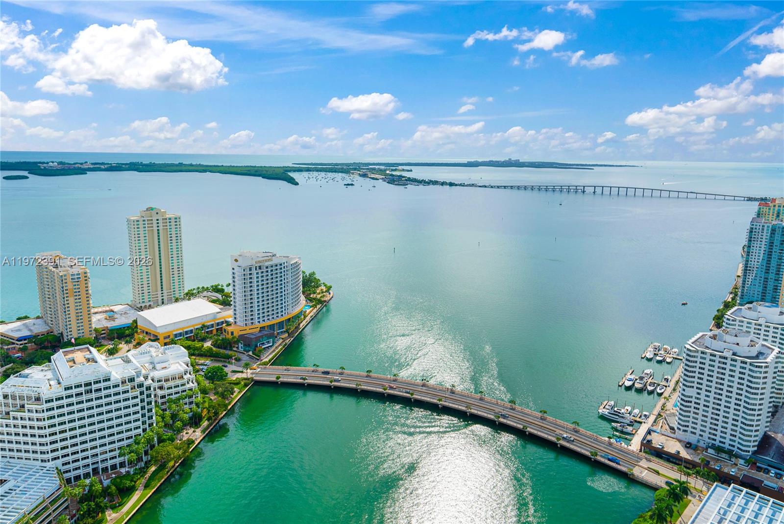 Iconic Arquitectonica building with interiors by Philippe Starck. Best line with views of Brickell Key, Biscayne Bay & skyline. Split 2/2 + Den. High-end appliances. Amenities: pool, spa, fitness, concierge. Short walk to Brickell City Centre. Basic cable/internet + 1 parking included. Unfurnished. Pet-friendly. Exterior renovations ongoing; balcony reopening expected soon per HOA. 1,450 sq ft living / 1,655 sq ft total. Non-original A/C, floors & washer/dryer. VACANT. Open to offers. Motivated seller.