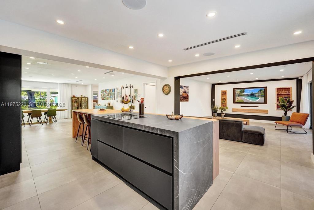 Open-concept living area at 4660 37th Ave - Home in Dania Beach