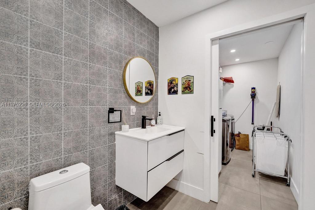 Well-appointed guest bedroom at 4660 37th Ave - Home in Dania Beach