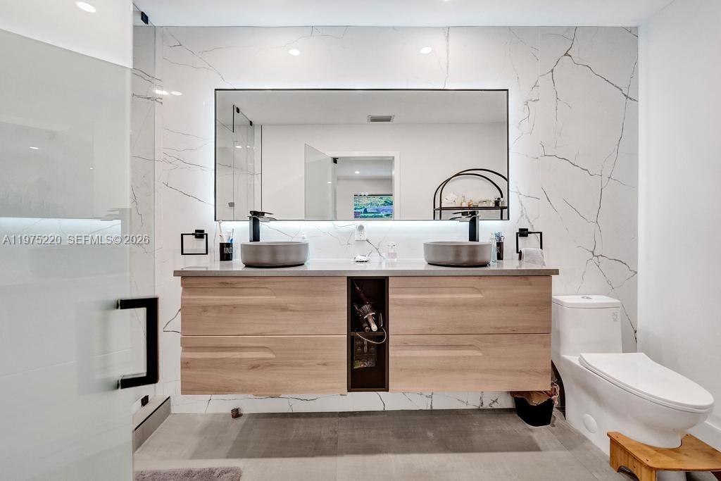 Modern kitchen with designer features at 4660 37th Ave - Home in Dania Beach