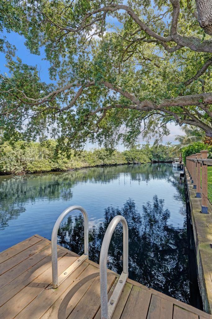 Elegant master bedroom retreat at 4660 37th Ave - Home in Dania Beach