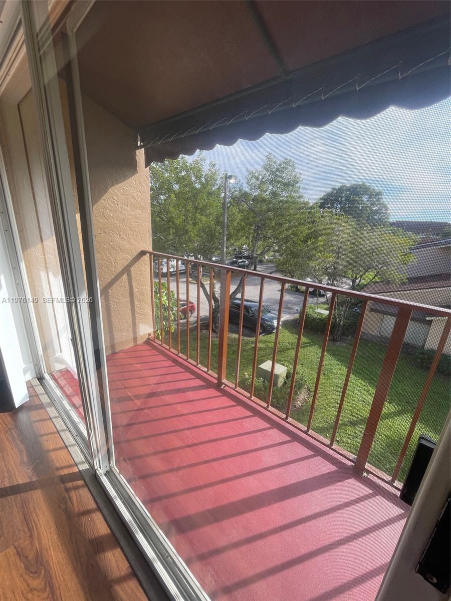 Private balcony with scenic views at 1251 Benoist Farms Rd - Condo in West Palm Beach