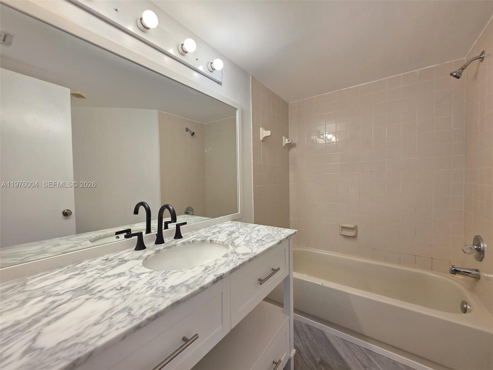 Open-concept living area at 210 Lake Pointe Dr - Condo in Oakland Park