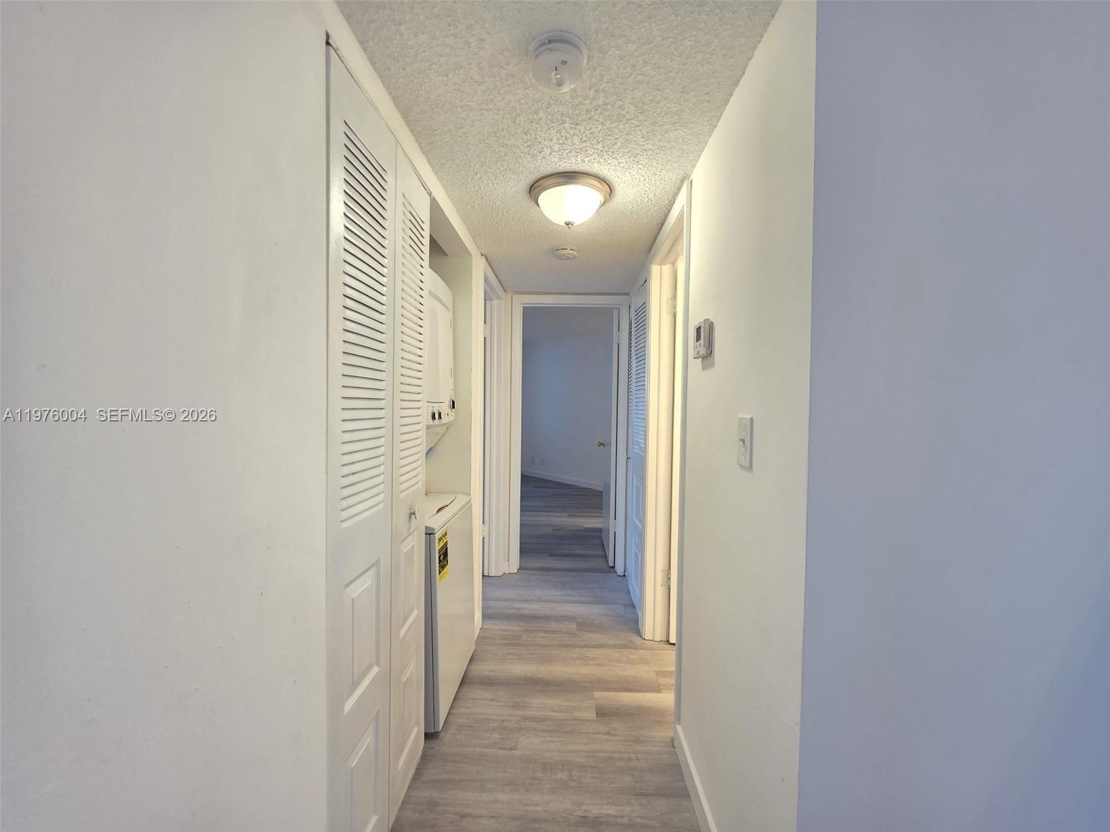 Modern kitchen with designer features at 210 Lake Pointe Dr - Condo in Oakland Park
