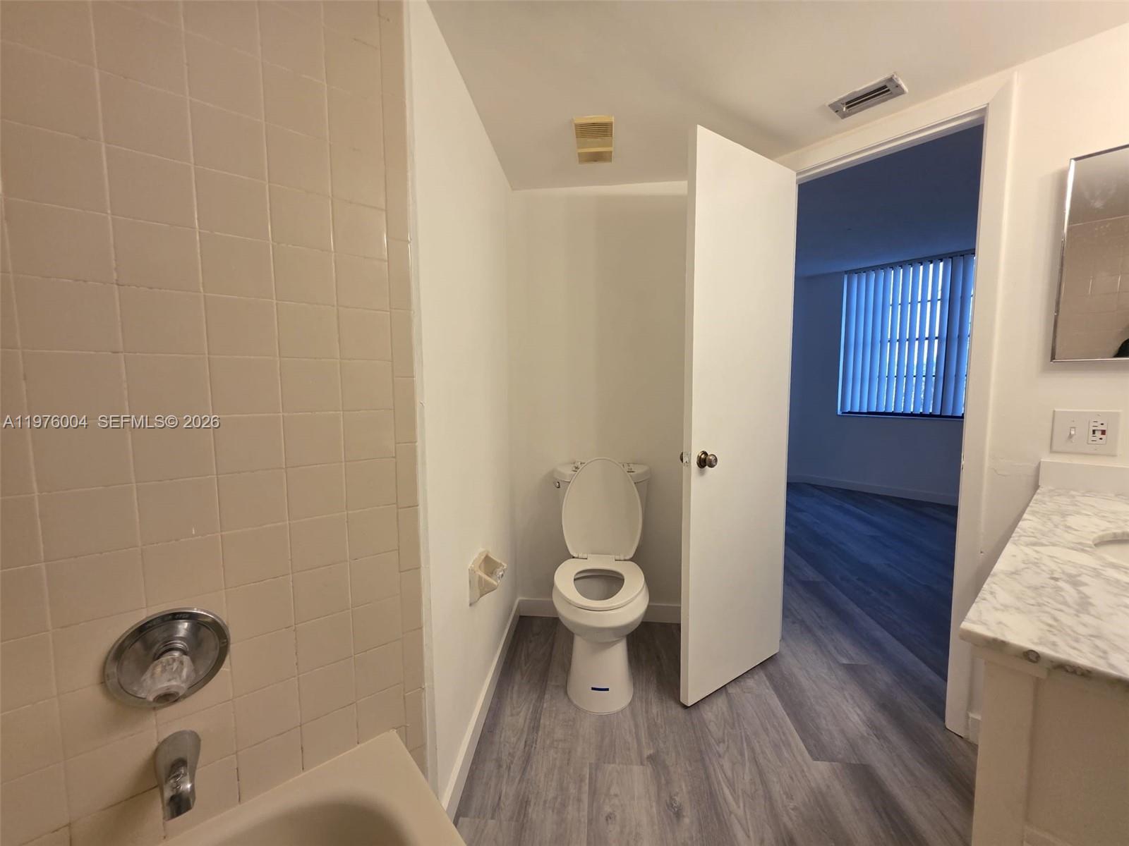 Open-concept living area at 210 Lake Pointe Dr - Condo in Oakland Park