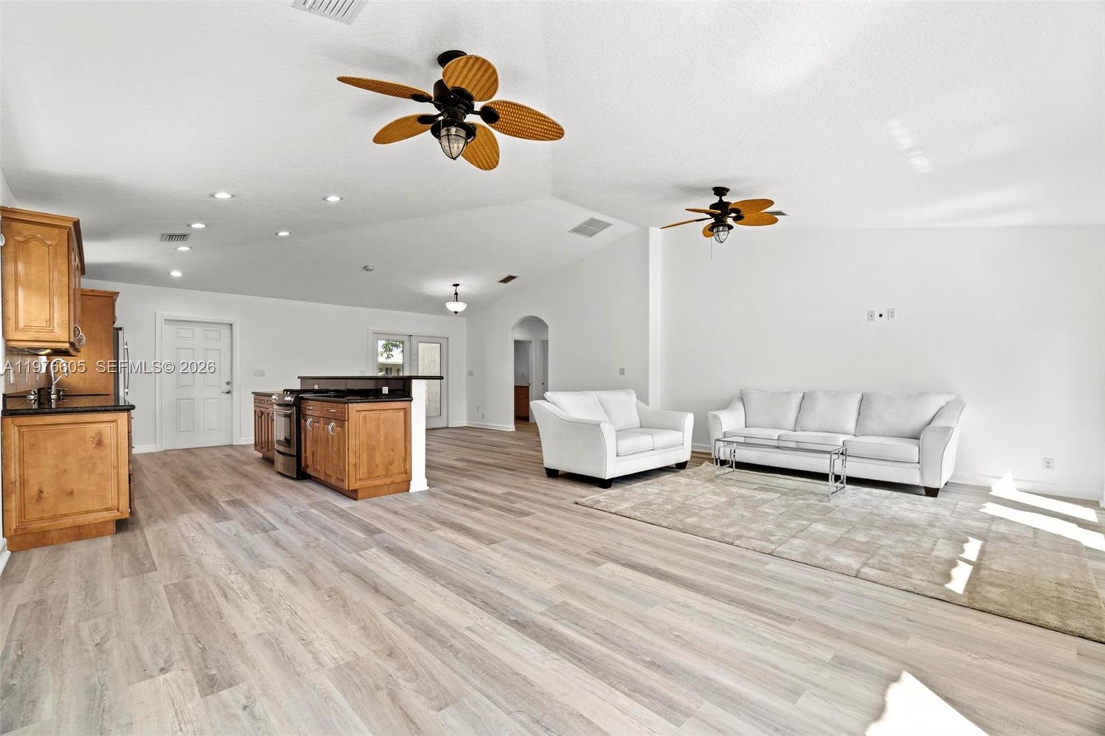 Spacious living room with panoramic views at 947 Nautilus Isle - Home in Dania Beach