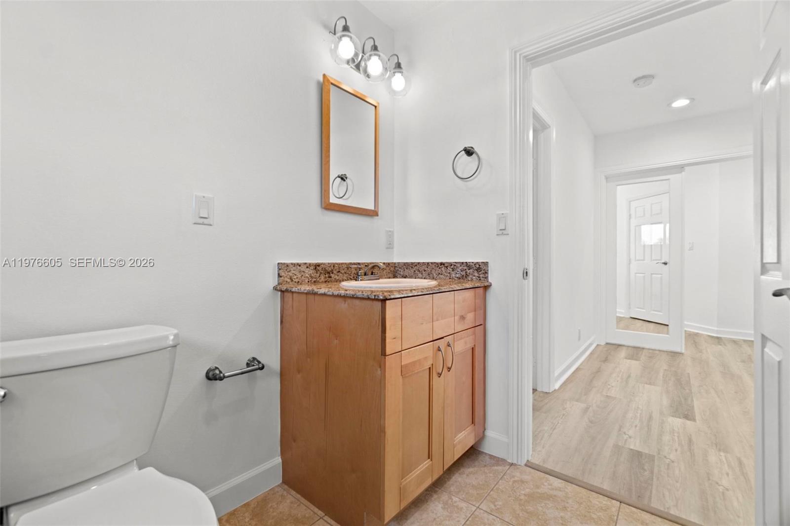 Well-appointed guest bedroom at 947 Nautilus Isle - Home in Dania Beach