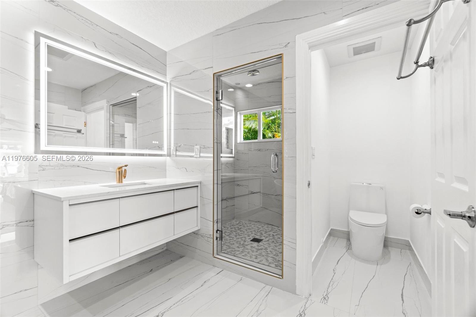Designer master bathroom at 947 Nautilus Isle - Home in Dania Beach