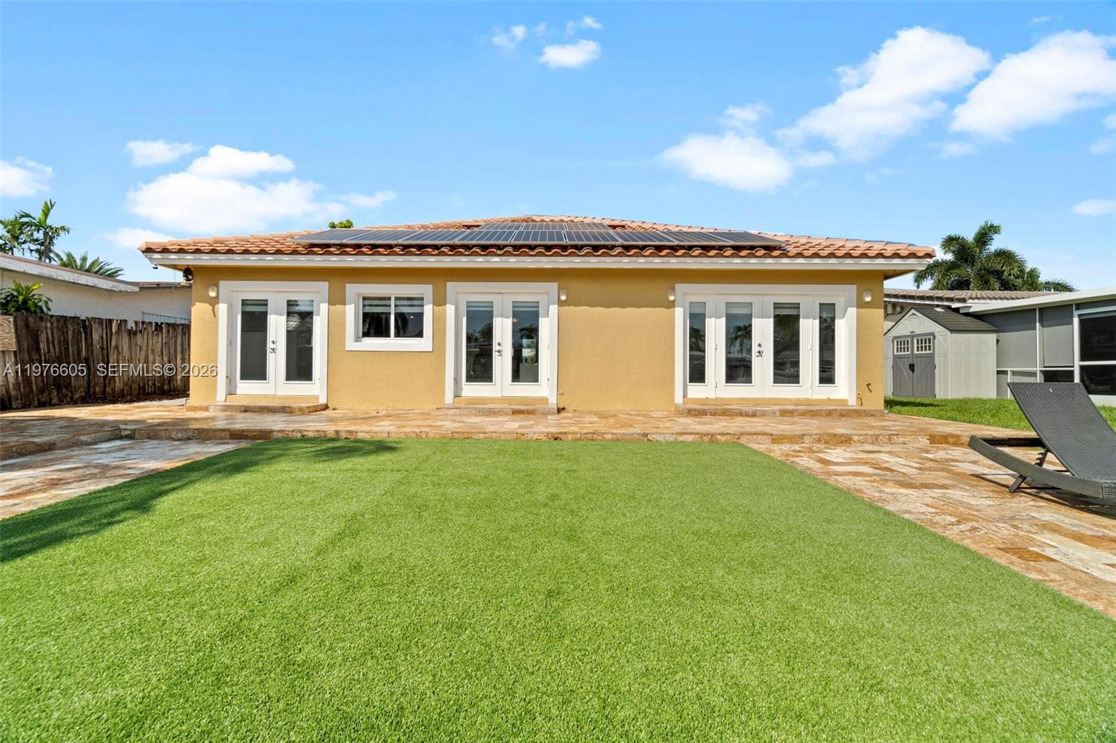 Spacious living room with panoramic views at 947 Nautilus Isle - Home in Dania Beach
