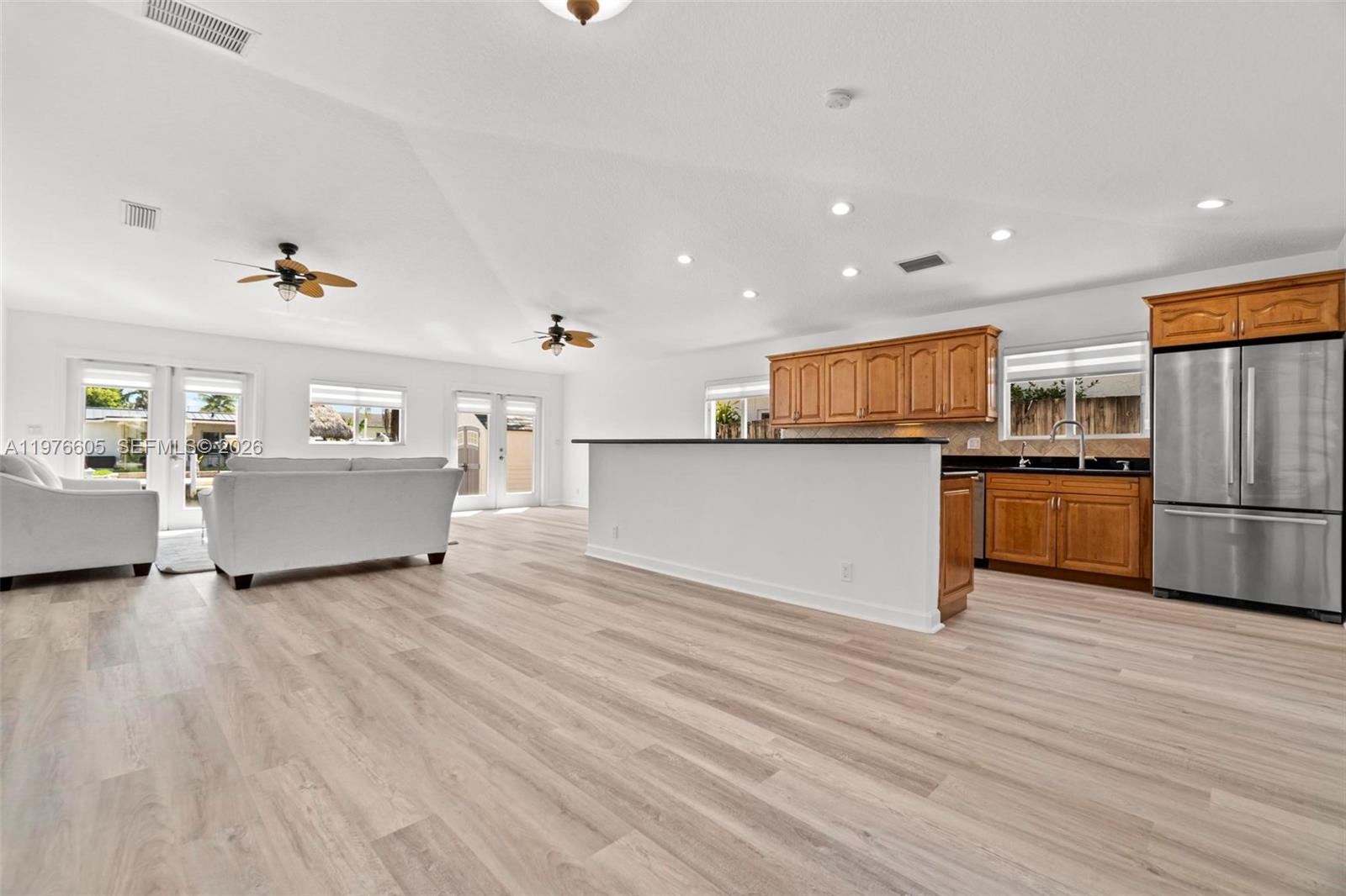 Modern kitchen with designer features at 947 Nautilus Isle - Home in Dania Beach