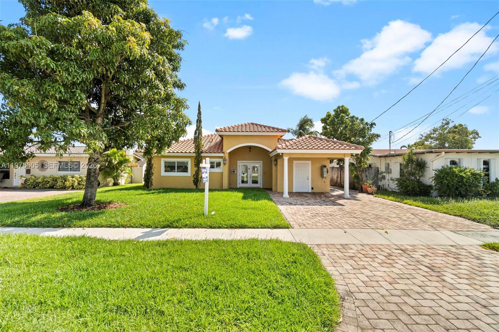 Elegant master bedroom retreat at 947 Nautilus Isle - Home in Dania Beach