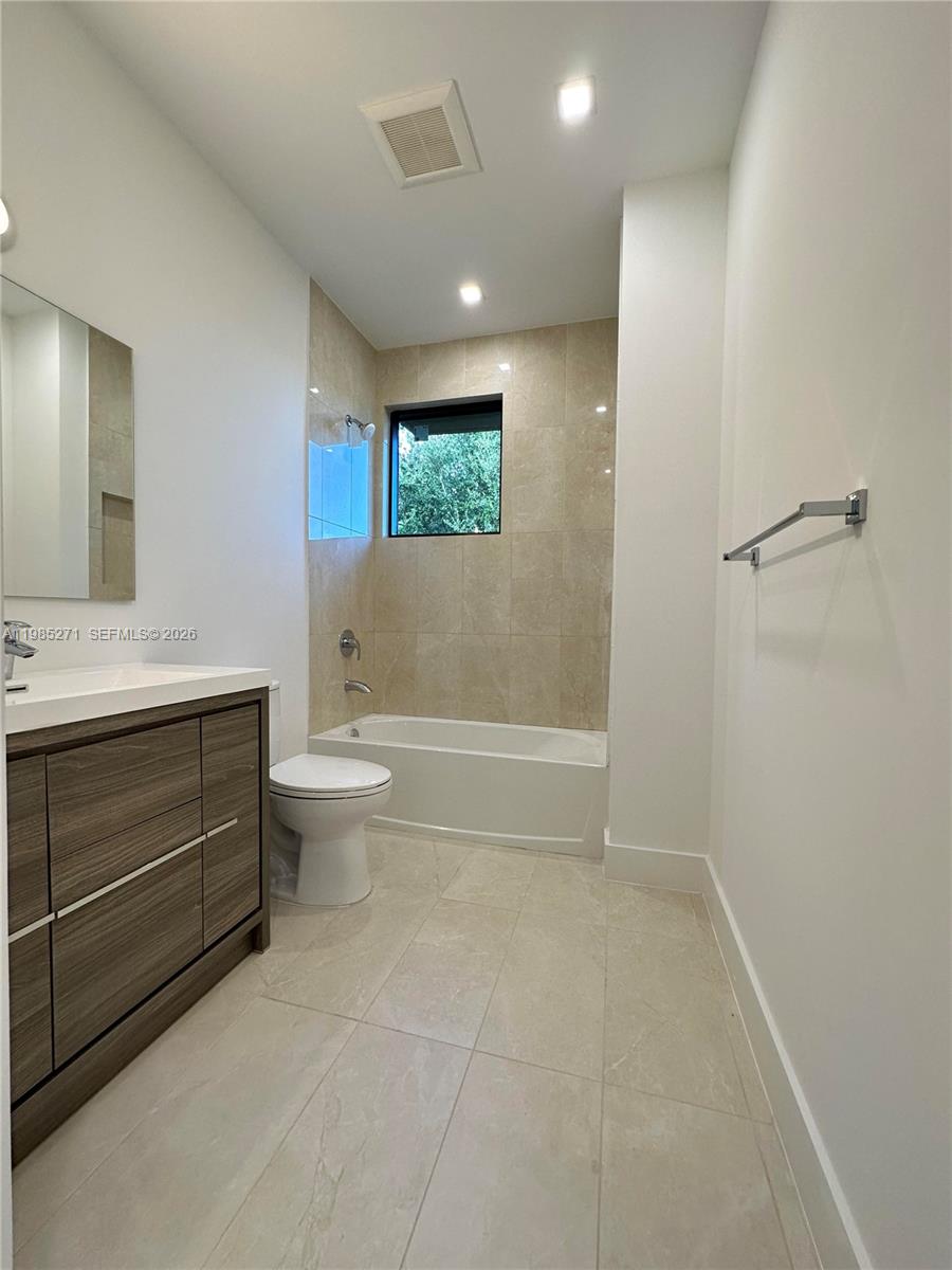 Modern kitchen with designer features at 5481 Oak Way - Townhouse in Dania Beach