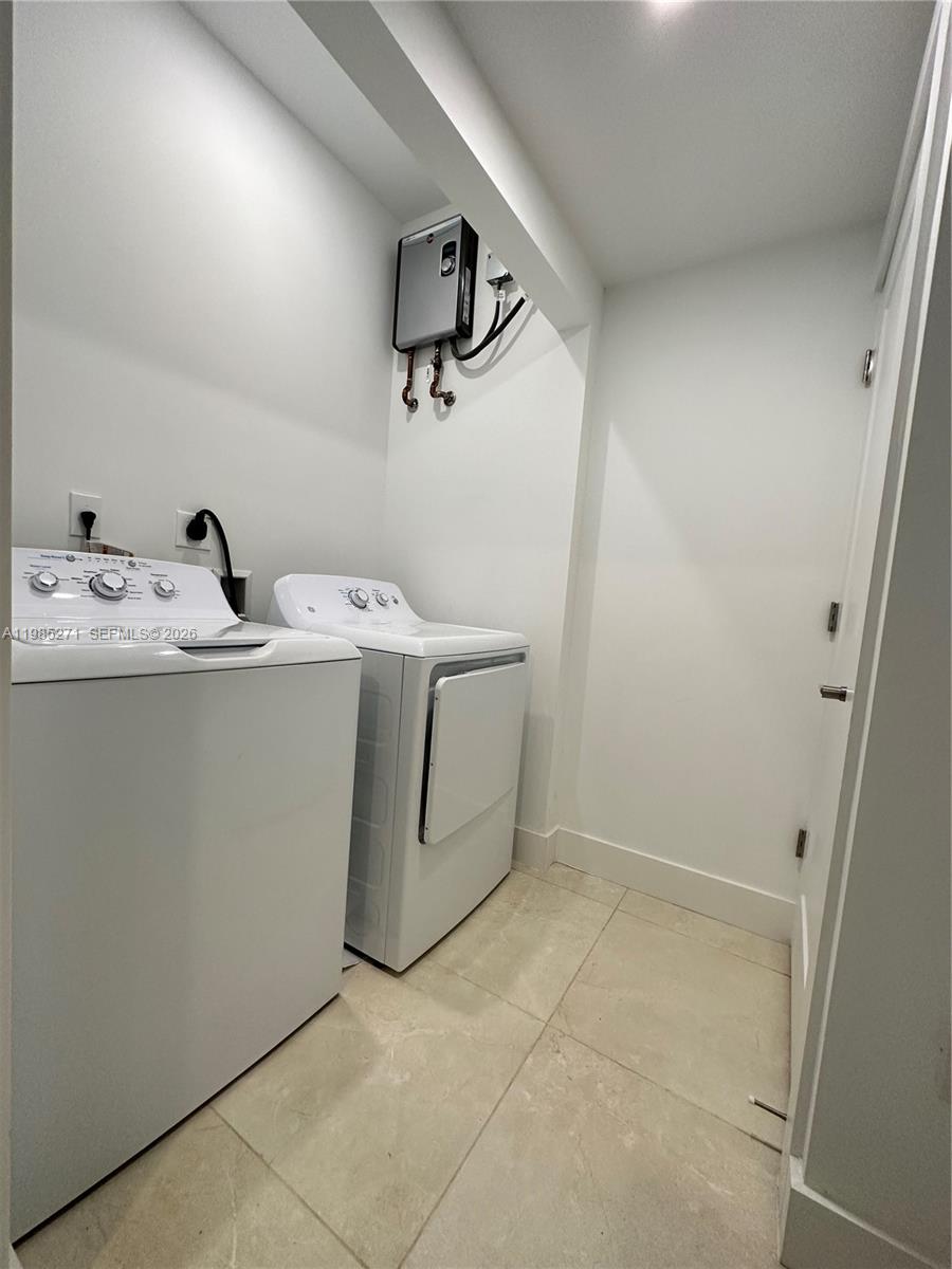 Open-concept living area at 5481 Oak Way - Townhouse in Dania Beach