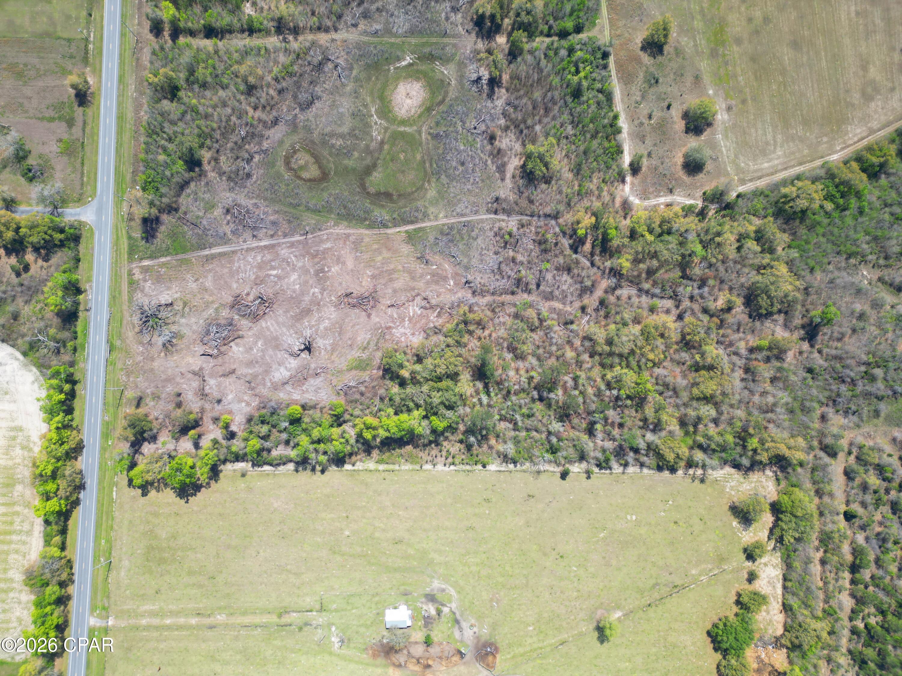 5th image of Xxxx Highway 69, Grand Ridge, FL 32442 | MLS# 787194