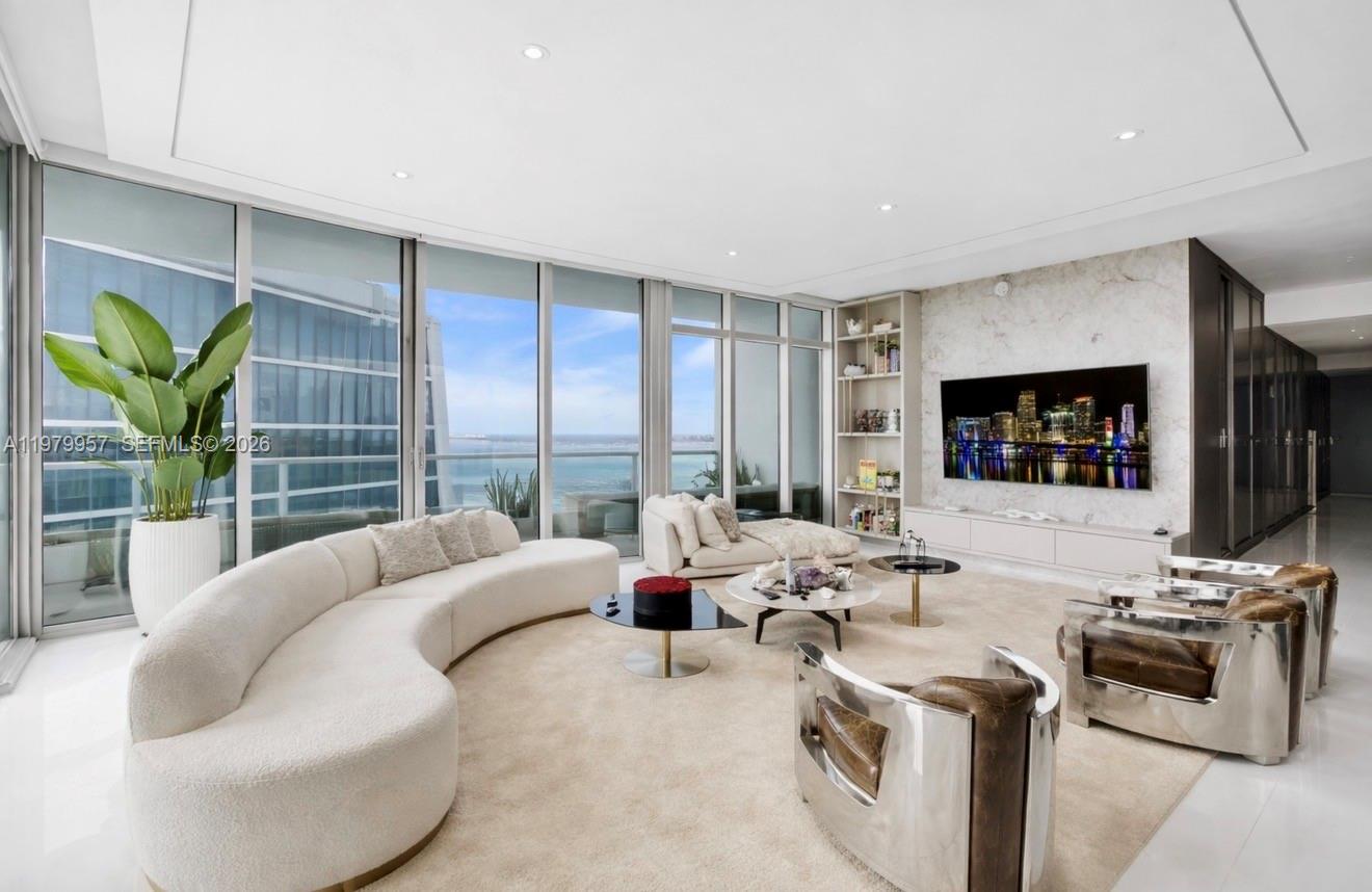 This stunning remodeled with luxury finishes PENTHOUSE offers a very spacious 2815 sqft of living area + 759 sqft of terraces totalizing 3,574 sqft. It welcomes you with exquisite & spacious rooms, elegant and welcoming ambients. Top of the line appliances. Wood panels, wall paper and Cristallo quartz Lux enhancing the walls. Sunset/city view and bay view, high ceilings & panoramic impact windows/doors, private balcony in each bedroom, in each bathroom and in the living room. 900 Biscayne Bay offers hotel-style amenities including full-service spa, fitness center, pools, activity room, movie theater, children’s playroom, library & more. The building was completely remodeled externally and internally offering confort and beautiful common areas. The City of Miami is transforming Downtown Miami into the Epicenter of the Americas. Increasing the livability, connecting and maximizing the Central Business District, Arts & Entertainment in Miami’s celebrated waterfront making this property a safe investment. The building allows renting for 30 days minimum making this property a great opportunity for investors too. No Assessment in place or for near future. Amazing investment. Motivated seller.