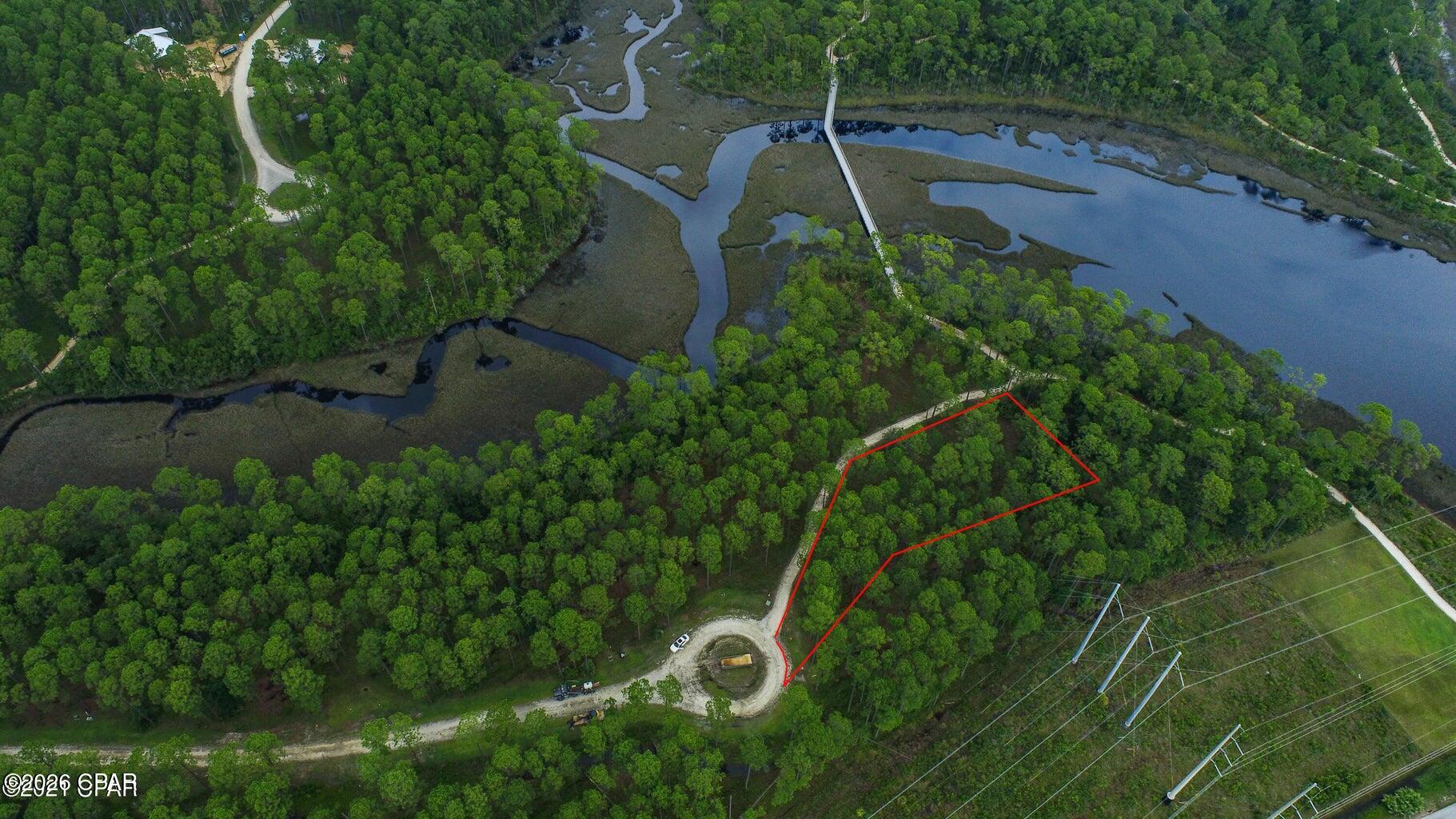 Rivercamps On Crooked Creek home at 6401 E Sundew Marsh Trail Lot 75, Panama City Beach, FL 32413