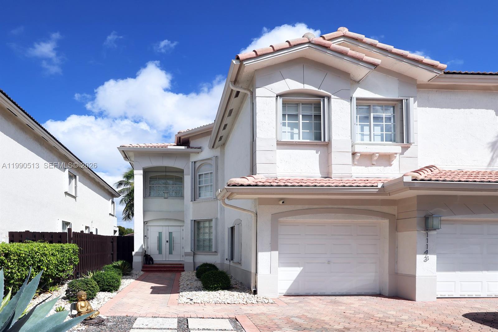 Experience this beautifully renovated home located in the exclusive community of Catalina at Doral Isles. This spacious residence offers 5 bedrooms and 3 bathrooms (some bedrooms feature en-suite bathrooms), thoughtfully designed for comfort and functionality. Featuring a modern open-concept kitchen, wine cooler and top of the line appliances, premium built-in appliances, including a built-in coffee system, double oven, and warming drawers, ideal for both everyday living and entertaining, every detail has been carefully curated. Enjoy a stunning backyard retreat complete with a private pool, pergola, and serene lake views—perfect for entertaining or relaxing while enjoying quality time with family. Living room chandeliers, as well as all mounted TVs, are included in the sale, except the ones in the exercise room and Family Room (with sound bar). Opportunities to own in Catalina at Doral Isles are extremely limited, and properties with this level of upgrades and features rarely become available, making this a truly exceptional offering. The property is equipped with security cameras.Situated in a gated and prestigious community of Doral Isles, with top-rated schools and resort-style amenities. Don’t miss this opportunity!