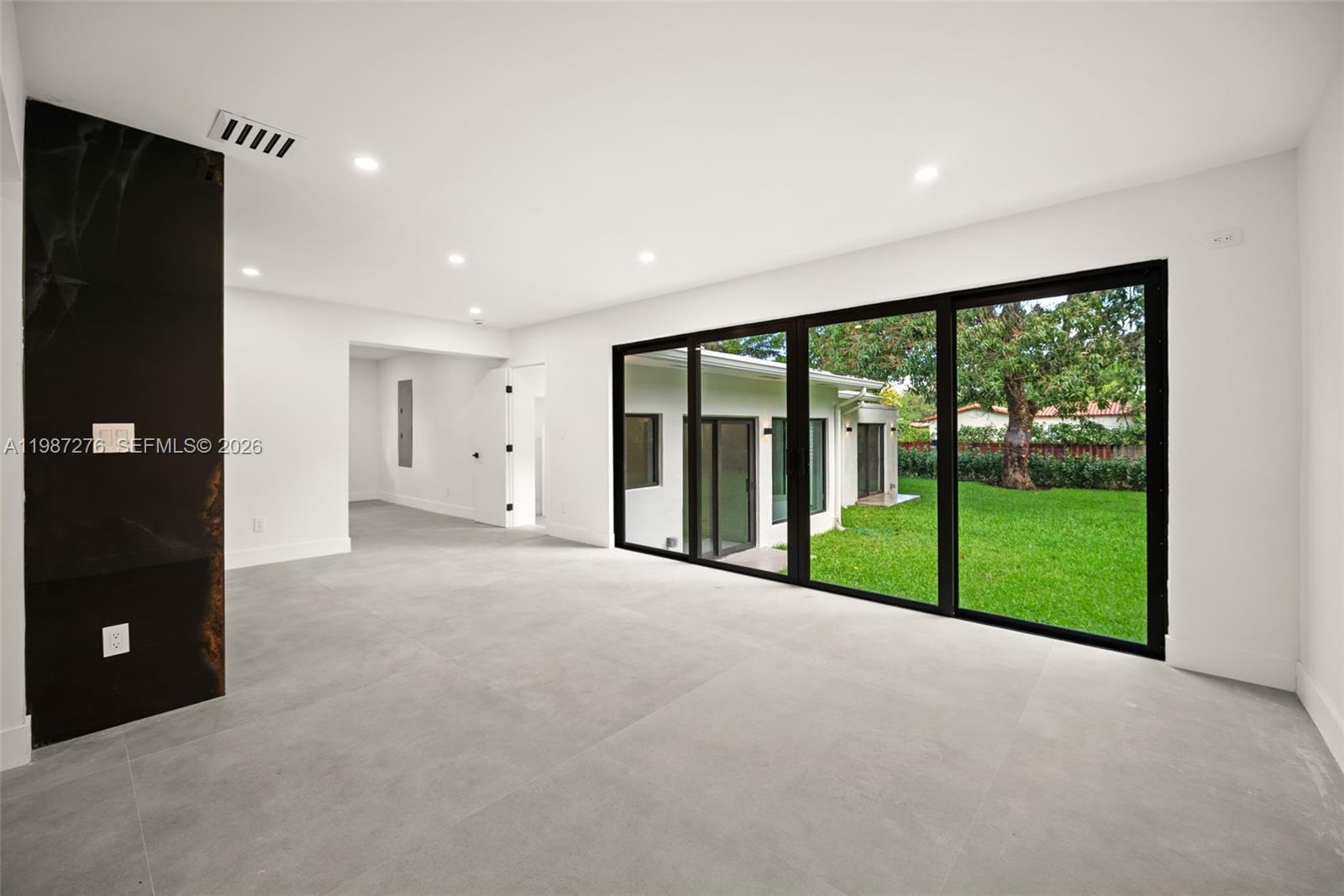 Open-concept living area at 235 91st St - Home in Miami Shores