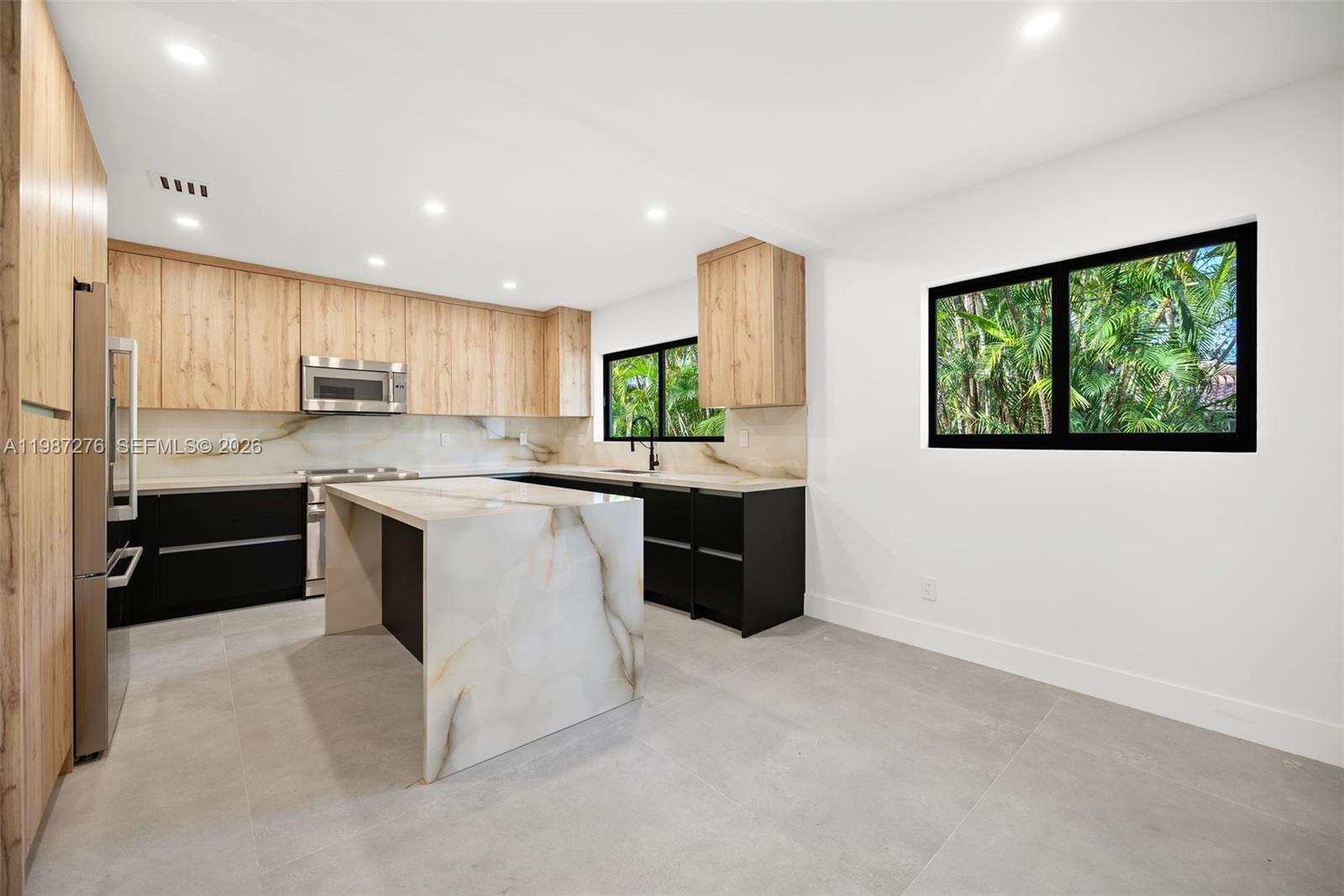 Elegant master bedroom retreat at 235 91st St - Home in Miami Shores