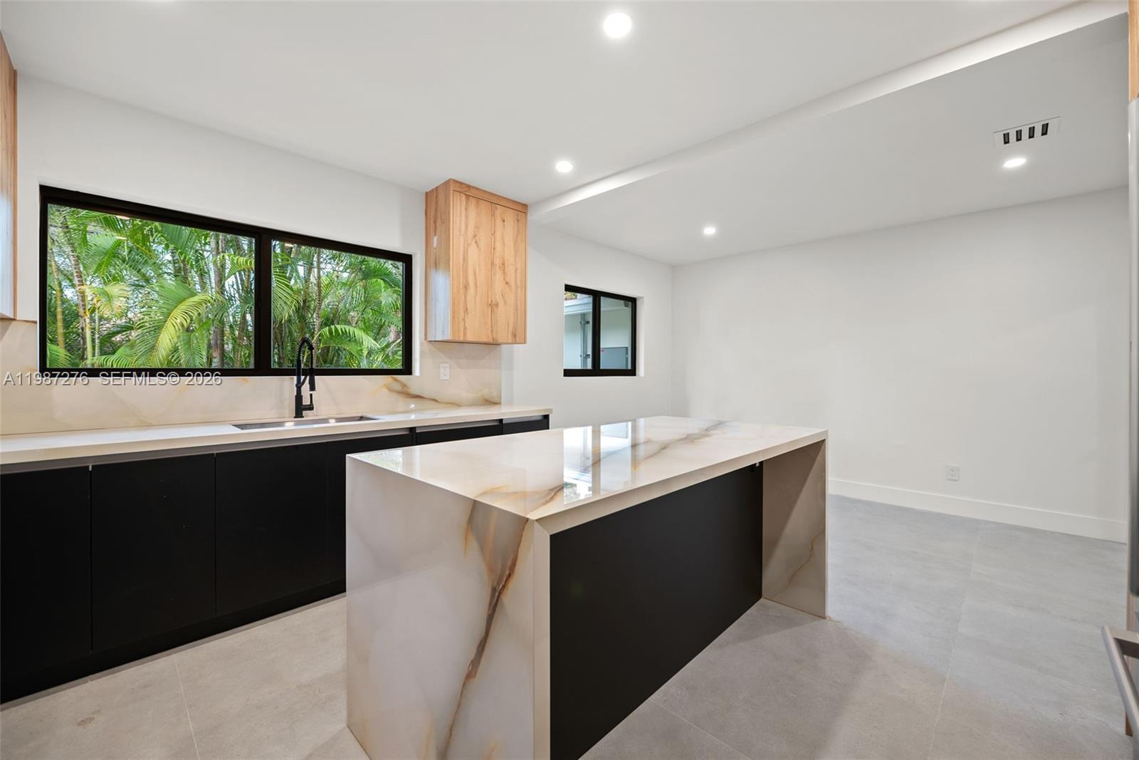 Additional living spaces at 235 91st St - Home in Miami Shores