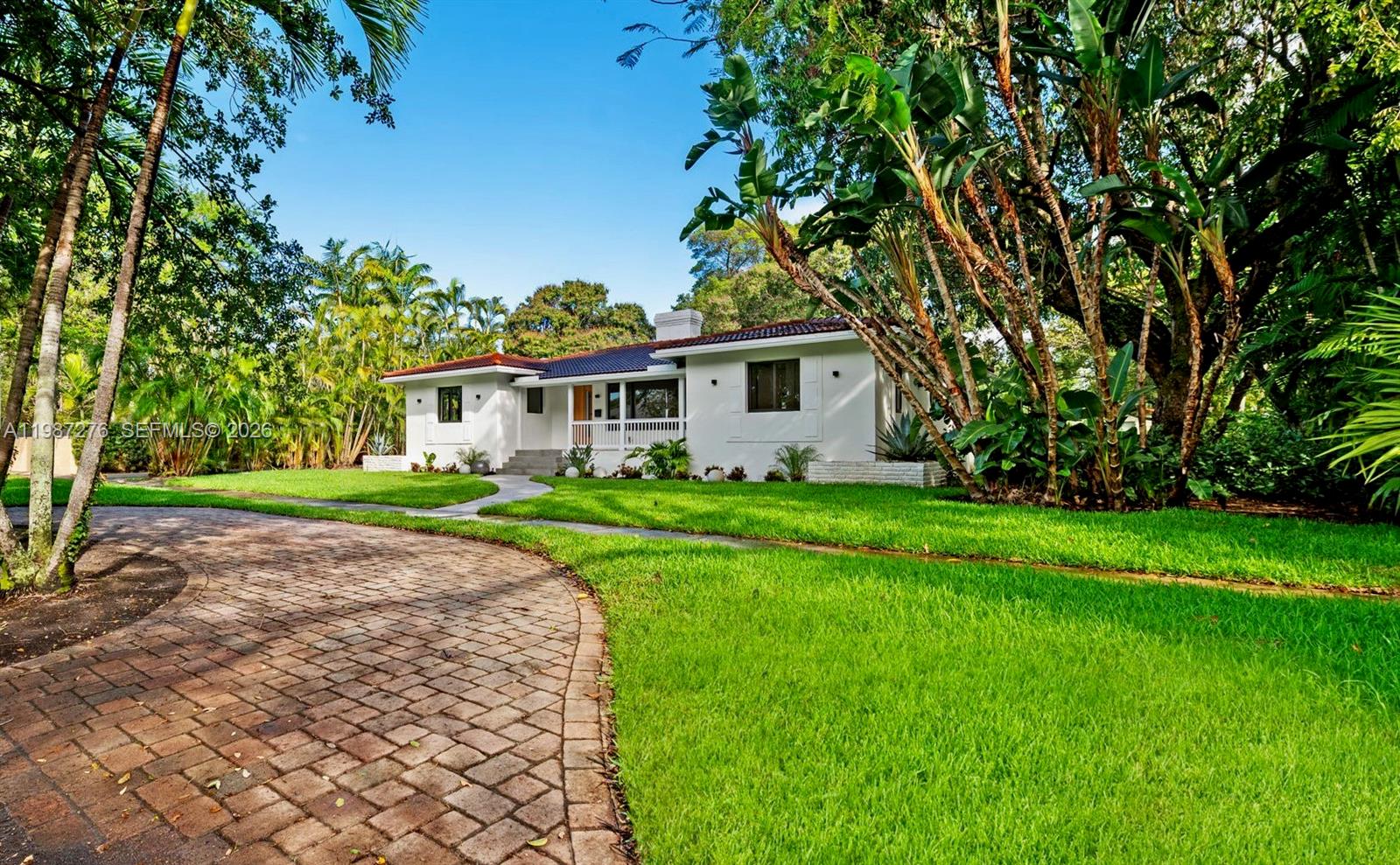 Open-concept living area at 235 91st St - Home in Miami Shores