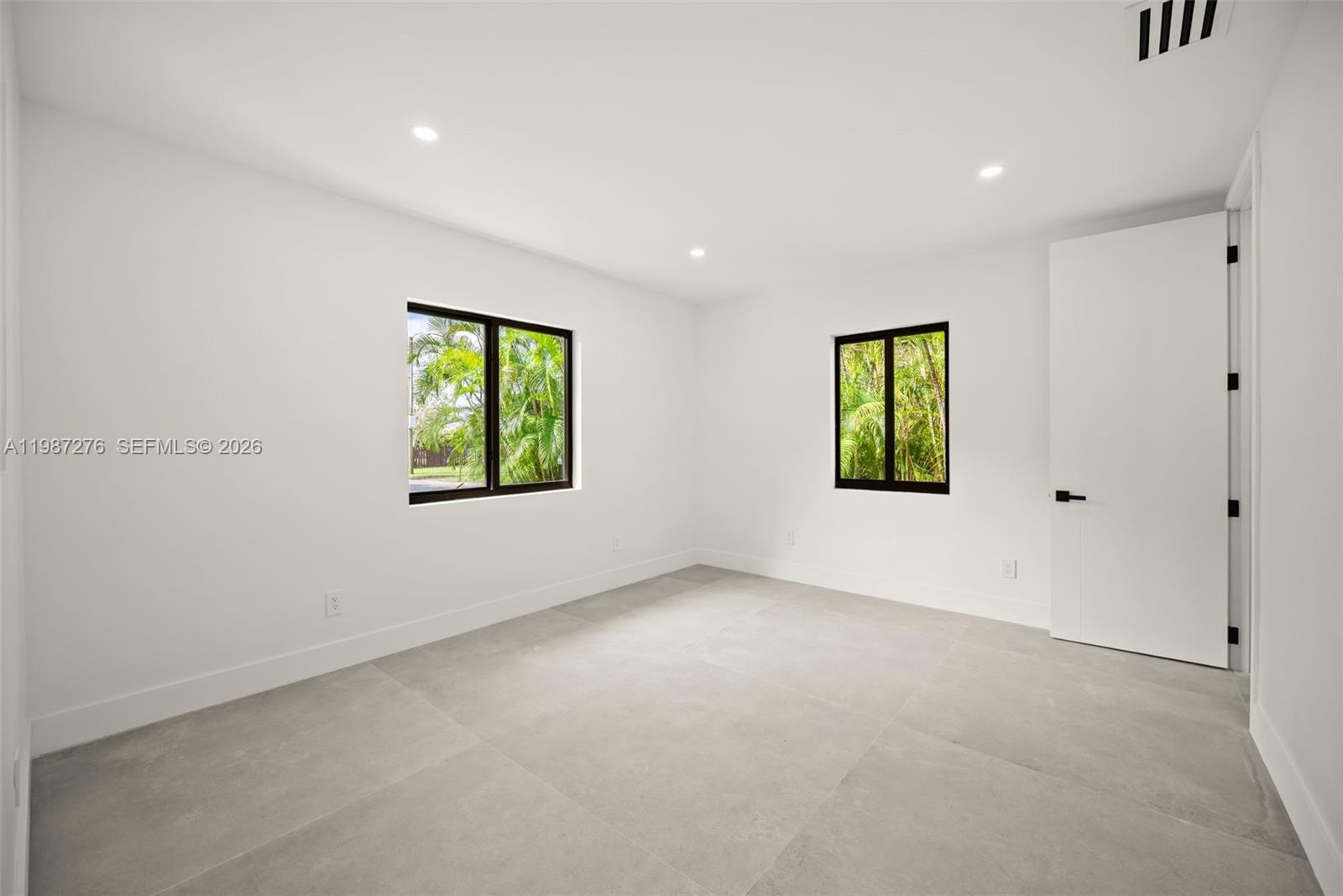 Open-concept living area at 235 91st St - Home in Miami Shores