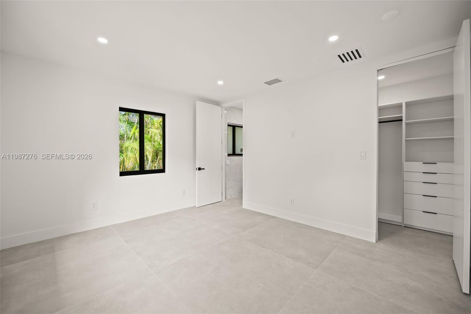 Modern kitchen with designer features at 235 91st St - Home in Miami Shores