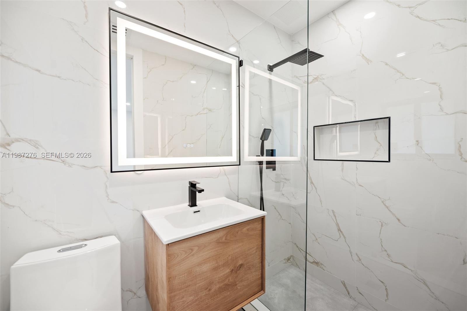 Elegant master bedroom retreat at 235 91st St - Home in Miami Shores