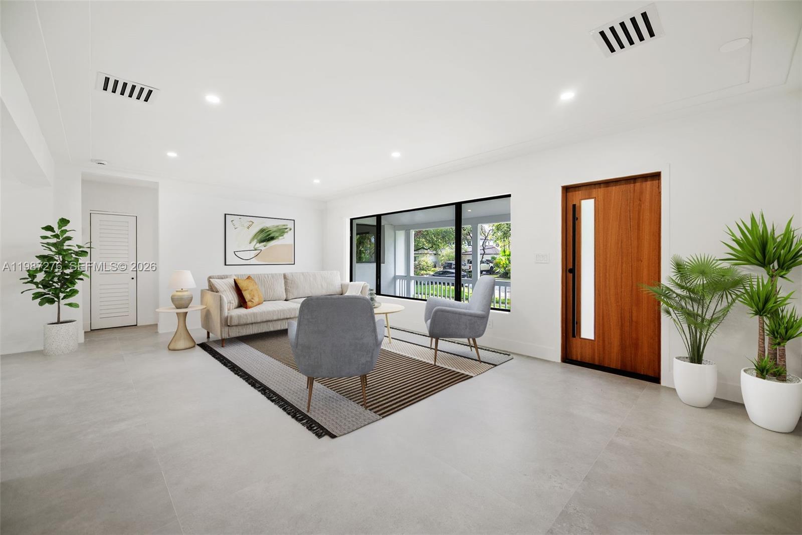 Elegant master bedroom retreat at 235 91st St - Home in Miami Shores