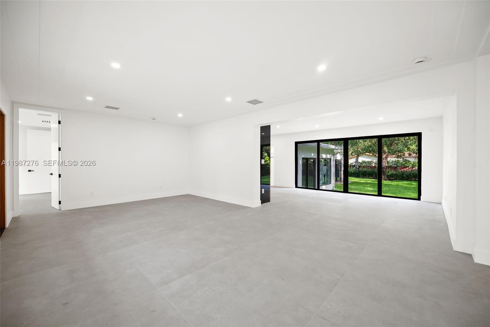 Well-appointed guest bedroom at 235 91st St - Home in Miami Shores