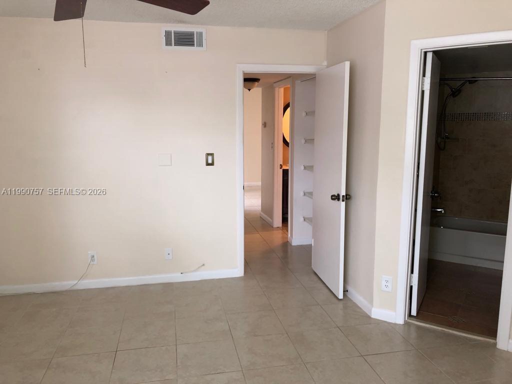 Designer master bathroom at 215 Lake Pointe Dr - Condo in Oakland Park