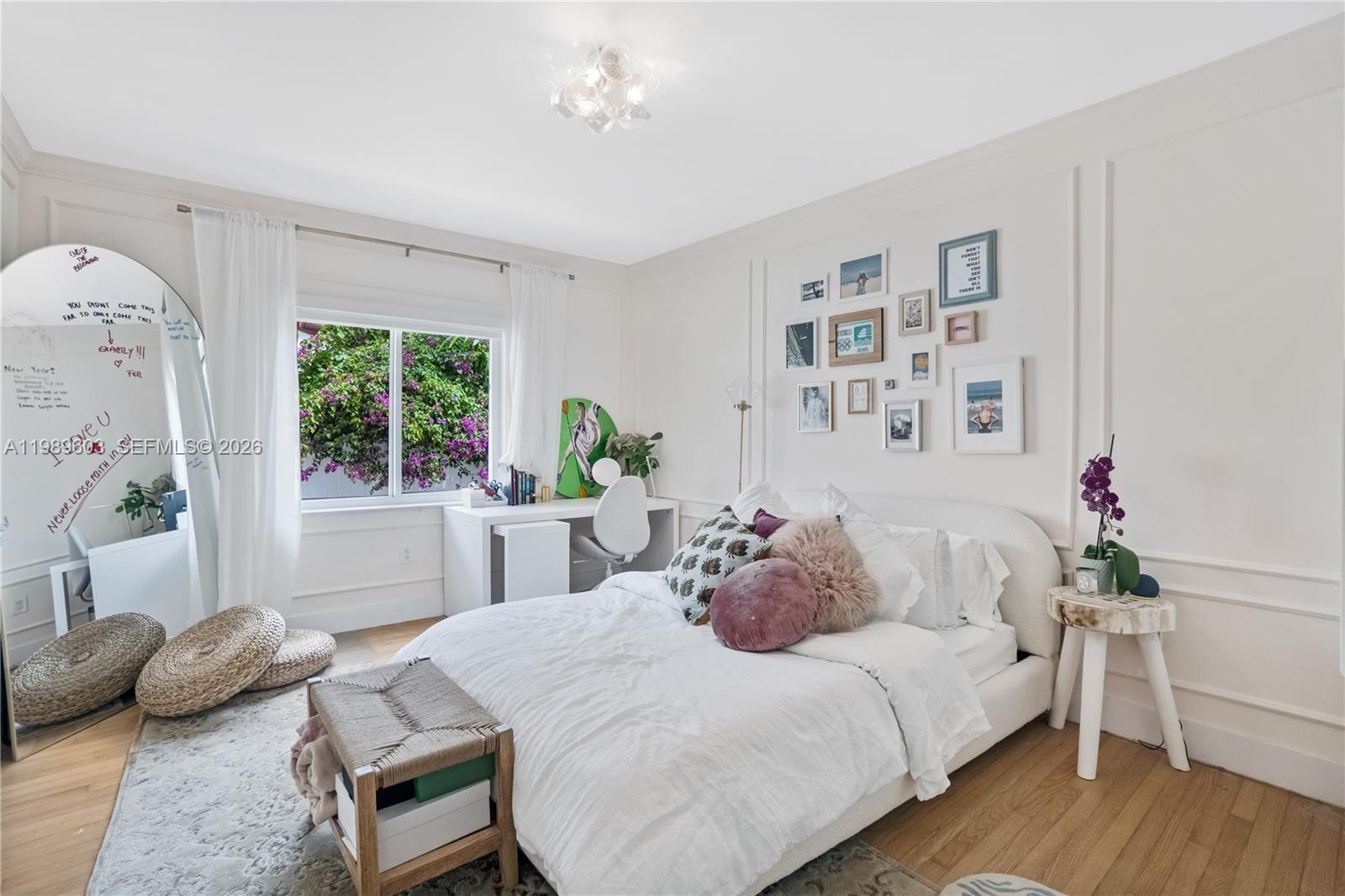 Elegant master bedroom retreat at 1022 91st Ter - Home in Miami Shores