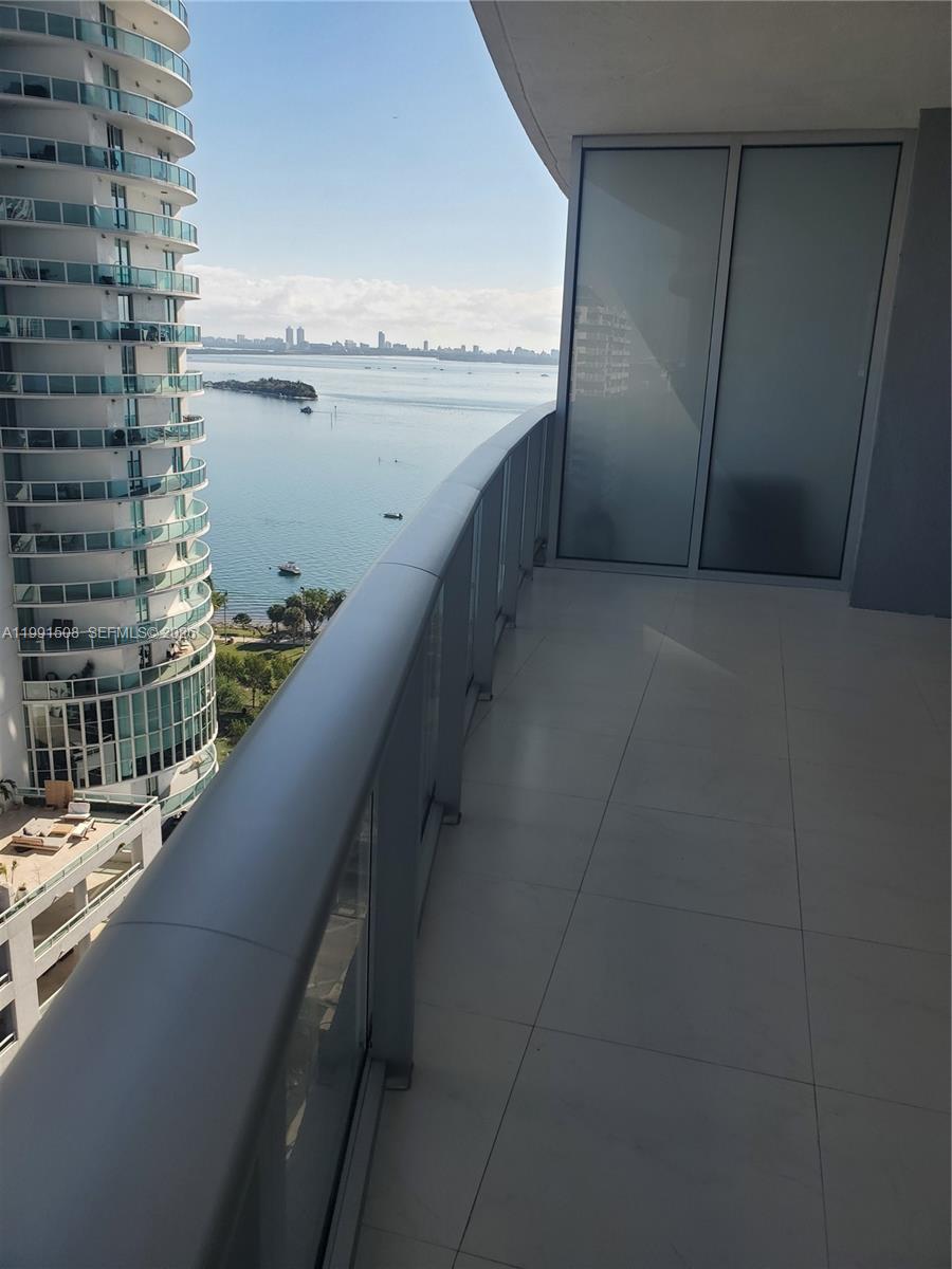 Beautiful 1-bedroom, 1.5-bath residence at Aria on the Bay offering a bright, open layout with floor-to-ceiling windows and stunning city and bay views. This modern unit features tile flooring throughout, a sleek European-style kitchen with high-end appliances, and a spacious primary suite with custom closets. Electric blinds in living and electric blackout in bedroom. Enjoy a private balcony perfect for relaxing or entertaining. The building offers resort-style amenities including pools, fitness center, spa, lounge areas, and more. Ideally located across from Margaret Pace Park and just minutes from Midtown, Wynwood, Design District, Downtown, and Miami Beach. Great opportunity for end-users or​​‌​​​​‌​​‌‌​‌‌‌​​‌‌​‌‌‌​​‌‌​‌‌‌ investors.