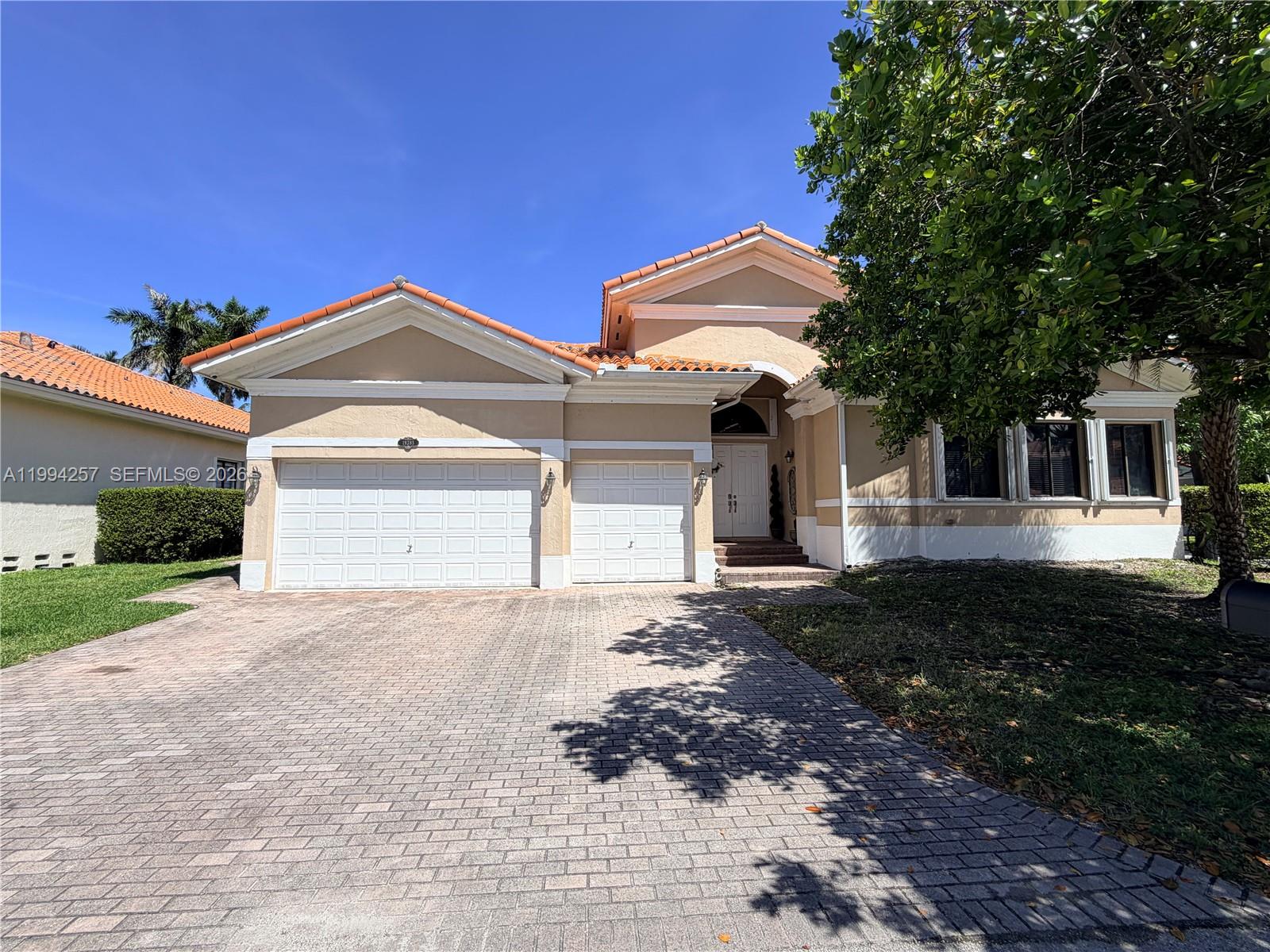 Charming one-story residence featuring 5 bedrooms and 4.5 bathrooms, situated on an oversized corner lot with a 3-car garage in the highly sought-after gated community of Cutler Cay. This beautifully maintained home has been freshly painted interior and showcases tile flooring throughout, elegant French doors, and custom wood cabinetry in both the kitchen and bathrooms. The spacious kitchen is equipped with granite countertops, stainless steel appliances, and abundant storage, seamlessly flowing into the open living areas. Filled with natural light, the thoughtfully designed layout includes formal living and dining spaces, a welcoming foyer, and a generous family room—perfect for both everyday living and entertaining. The primary suite offers a luxurious retreat with a frameless glass shower, California closets, and recessed lighting. Additional highlights include accordion shutters for added protection and peace of mind. Step outside to a large private backyard featuring a covered terrace and outdoor kitchen—ideal for hosting gatherings or enjoying relaxing evenings at home. Residents of Cutler Cay enjoy resort-style amenities, all within close proximity to major expressways, dining, shopping, and top-rated schools.