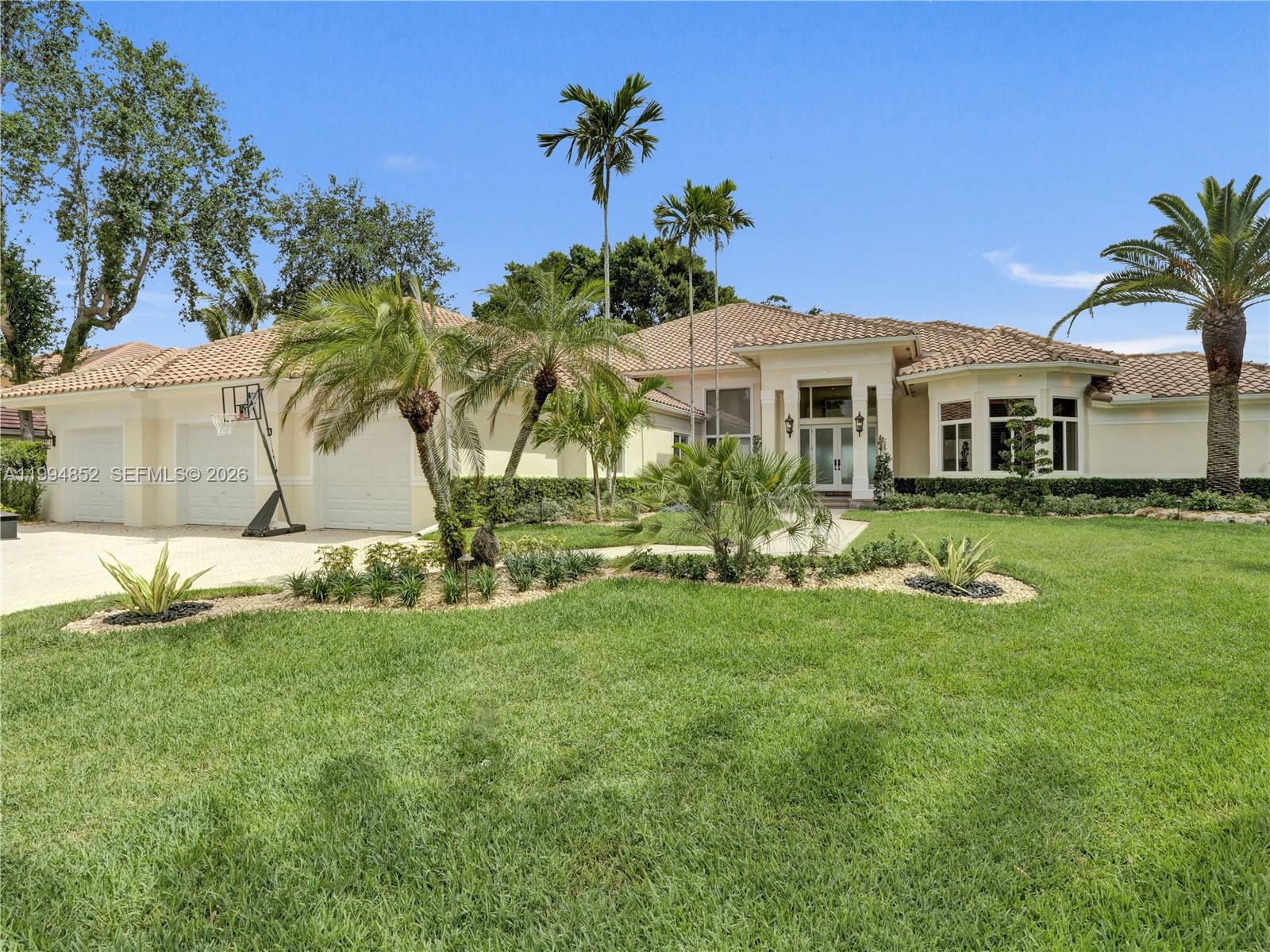 ONE-OF-A-KIND, PRISTINE & METICULOUSLY MAINTAINED RESIDENCE WITH ENDLESS WATER AND GOLF VIEWS! Presenting a rare and exceptional offering in the Princeton enclave of Weston Hills Country Club. Perfectly situated on an expansive 18,972 sq ft cul-de-sac lot, this residence showcases stunning, unobstructed golf and water views from nearly every vantage point. From the moment you arrive, the home makes a striking impression with its impressive curb appeal, grand driveway, three car garage, and beautifully curated landscaping, all set within a premier cul-de-sac location.Inside, the home exudes both sophistication and warmth, featuring 5 spacious bedrooms, 4 full baths, and 2 half baths, plus a library/office. The thoughtfully designed 4,806 sq ft floor plan offers seamless flow for both everyday living and elegant entertaining. At the heart of the home is a stunning chef’s kitchen, complete with top-of-the-line appliances and exceptional finishes.The outdoor living areas are truly spectacular and designed to impress, featuring a resort-style pool and patio, built-in barbecue, expansive entertaining areas, lush landscaping, premium turf, and a custom putting green.Additional highlights include a home automation system that allows the homeowner to manage features of the home effortlessly from a central device, hurricane impact windows and doors, and a well maintained 10-year-old roof.Located within one of Weston’s most exclusive and sought-after communities, this home offers the perfect blend of privacy, luxury, and lifestyle, with convenient access to top rated schools, shopping, dining, and major highways. This is a rare opportunity you won’t want to miss! Move-in ready and truly a must see, as photos simply do not capture its full beauty.