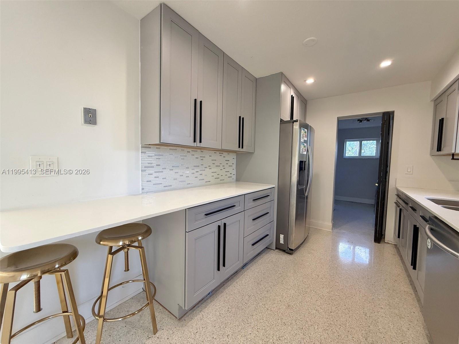 Spacious living room with panoramic views at 207 12th Ave - Home in Dania Beach