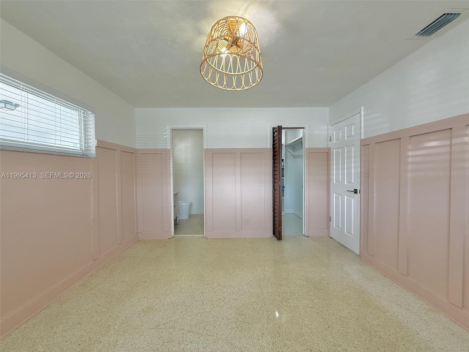 Elegant master bedroom retreat at 207 12th Ave - Home in Dania Beach