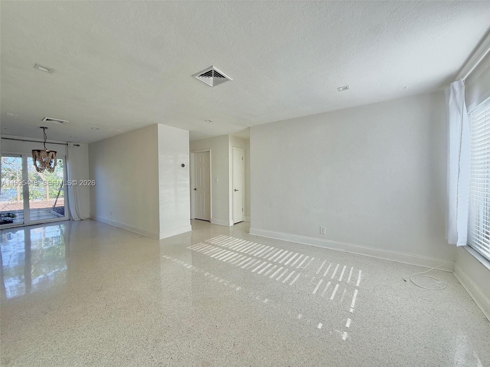Well-appointed guest bedroom at 207 12th Ave - Home in Dania Beach