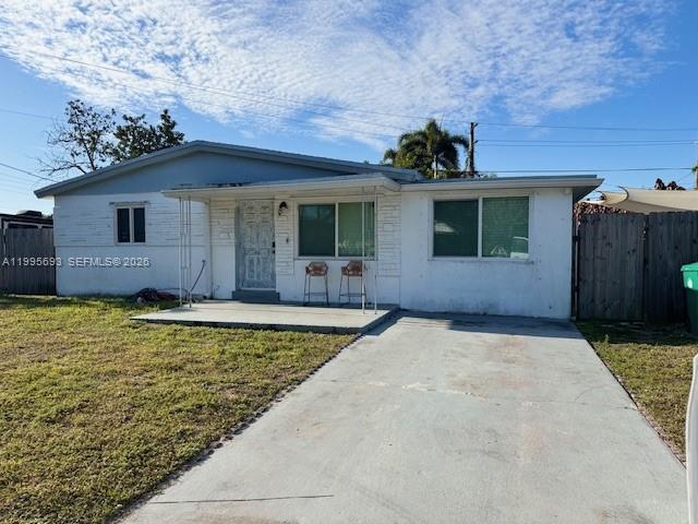 Open-concept living area at 4020 50th St - Home in Dania Beach