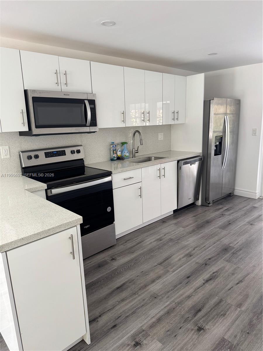 Well-appointed guest bedroom at 4020 50th St - Home in Dania Beach