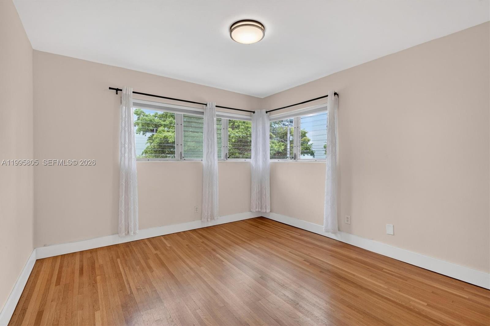 Elegant master bedroom retreat at 10081 Bay Harbor Dr - Condo in Bay Harbor Islands