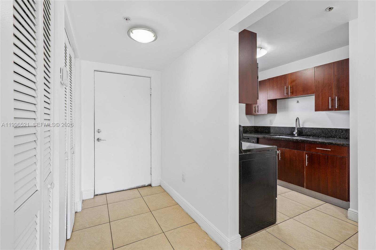 Modern kitchen with designer features at 4137 Stirling Rd - Condo in Dania Beach