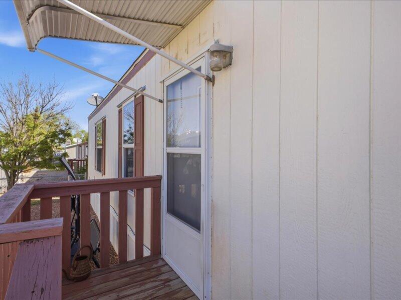Photo 2 of Manufactured home for sale at 7401 San Pedro Dr Ne #TRLR 166, Albuquerque, NM 87109 | MLS# 1101270 | Listing updated on 2026-10-11